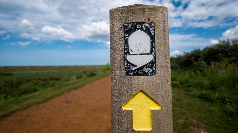 A waymarker on the Norfolk Coast Path.